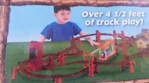 See the kid on the box? If you look closely, you'll see he's not really smiling. He's gritting his teeth with rage and is reaching out to grab and throw Thomas across the room.